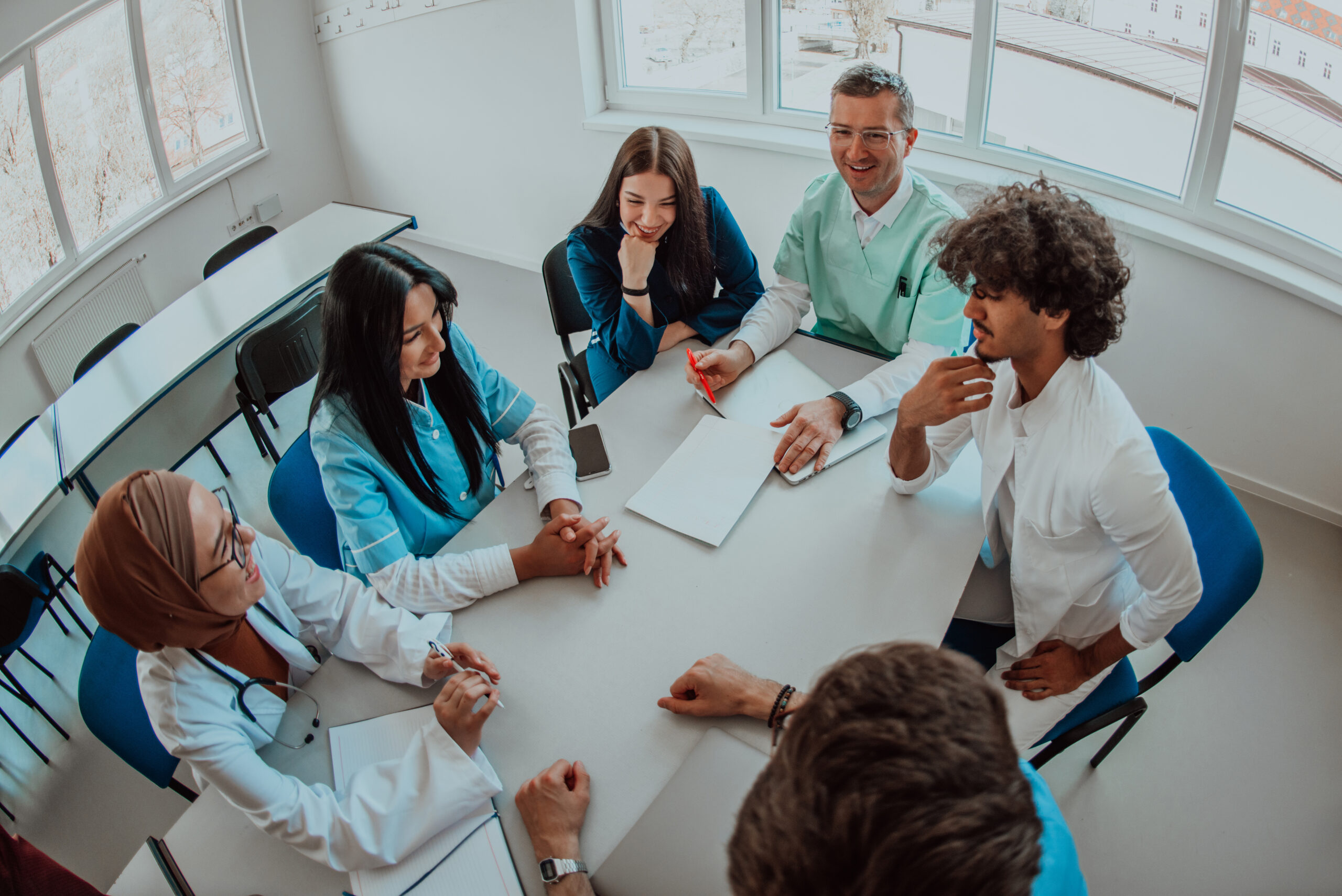 Group of people talking at a table